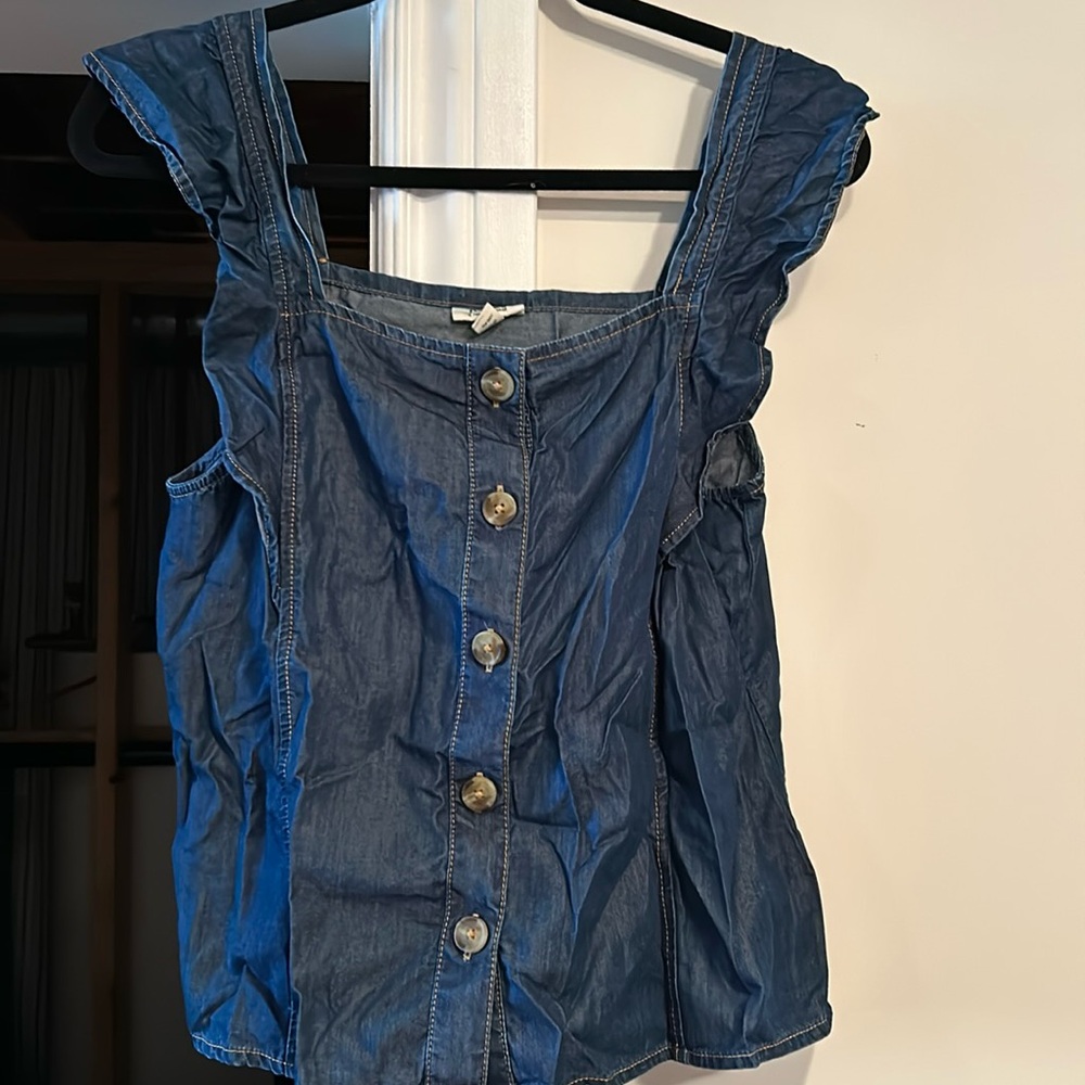 Denim ruffle strap tank top with functional buttons. Lovell and cotton blend
